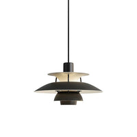 Black and beige layered pendant light displayed against a plain background with a warm modern design.