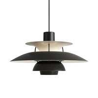 Black and beige layered pendant light displayed against a plain background with a sculptural stacked-shade design.